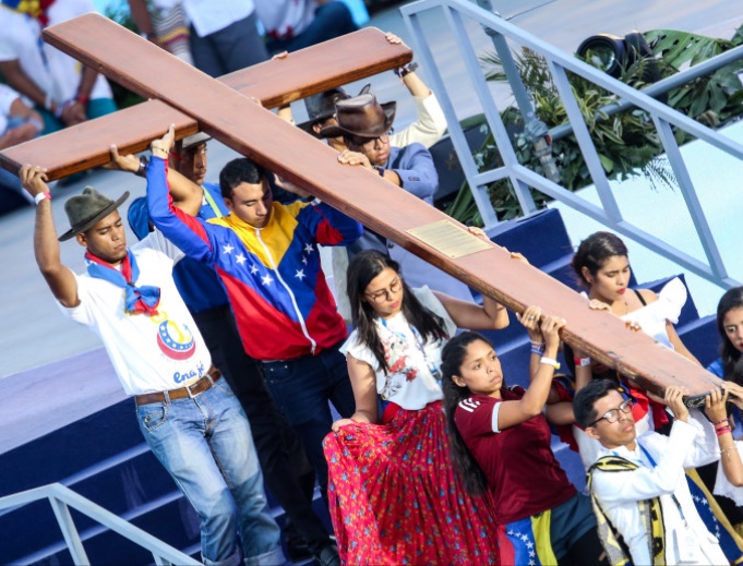 Participants carry the cross at a Via Crucis that was presided vy Pope Francis, during the 34th World Youth Day in Panama City on Jan. 25.