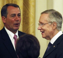 Sen. John Beohner, R-Ohio and Sen. Harry Reid, D-Nev., chat at a recent dinner in Washington.