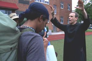 BLESSED BY A MONK. Students receive a blessing by a Benedictine monk at St. Benedict’s Prep in Newark, N.J. 