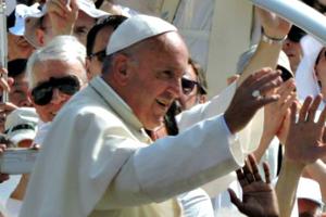 Pope Francis rides through Turin's Piazza Vittorio on June 21.