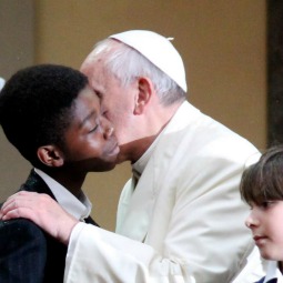 Pope Francis meets children of Rome‘s Sacred Heart of Jesus at the Praetorian Barracks parish on Jan. 19.