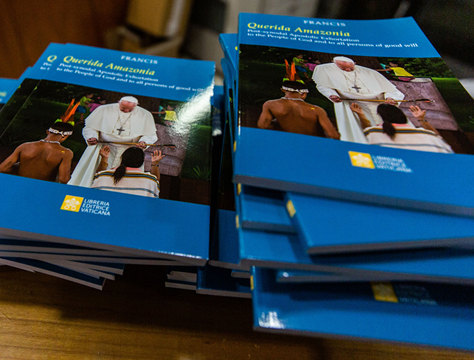 Copies of the apostolic exhortation ‘Querida Amazonia’ await distribution at the press conference for the presentation of the post-synodal document at the Vatican Press Office on Feb. 12.
