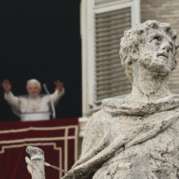 ADVENT ANGELUS. A weathered statue of a saint is seen on the colonnade as Pope Benedict XVI arrives to lead the Angelus prayer from the window of this apartment overlooking St. Peter's Square at the Vatican Dec. 5. 