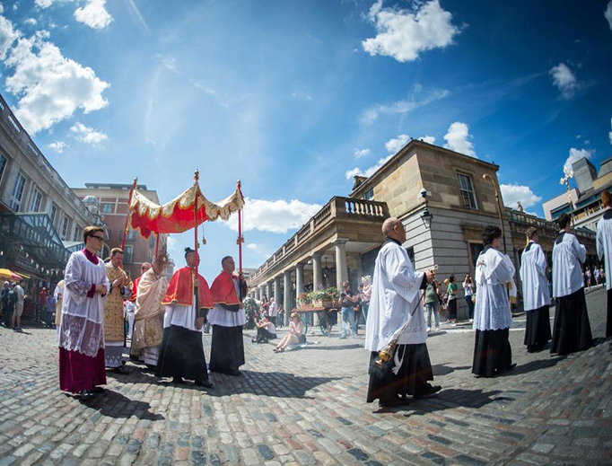  Holy Mass and Corpus Christi procession at historic church in London's Covent Garden area. 