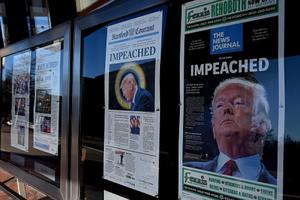 Above, newspaper front pages are on display Dec. 19 at the Newseum in Washington after President Donald Trump’s historic Dec. 18 impeachment by the U.S. House of Representatives. 
