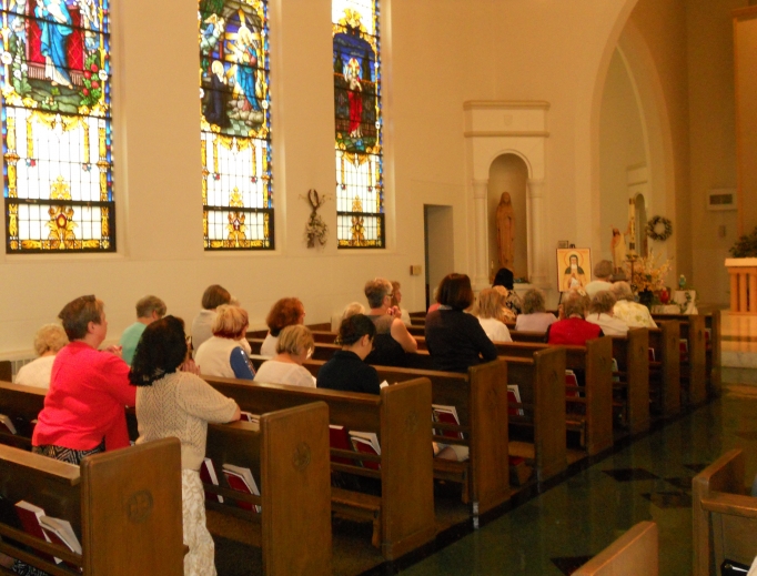 Members of the Avilas pray a Holy Hour in the chapel of St. Mary Seminary in the Diocese of Cleveland. 