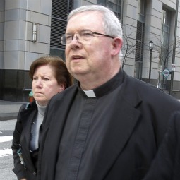 Msgr. William Lynn walks away from courthouse after a hearing in Philadelphia March 14. Msgr. Lynn, 60, former secretary of the clergy for the Archdiocese of Philadelphia, has been charged for allegedly failing to protect children from two of alleged abusers of clergy sex abuse. 