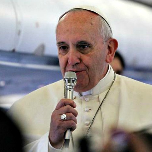 Pope Francis speaks to journalists on the papal plane on his way to Strasbourg, France, Nov. 25.


