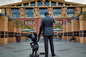 CEO Bob Iger, of Disney, whose The Partners Statue, depicting Walt Disney and Mickey Mouse, is seen in front of the Seven Dwarfs Building (aka ‘Team Disney Building’) on the Walt Disney Studios lot in Burbank, California, told Reuters: ‘Many people who work for us will not want to work there. We will have to heed their wishes.’