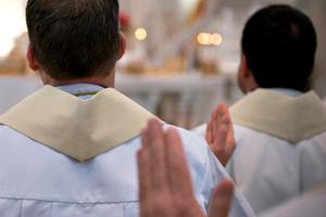 Priests celebrate Mass at the Cathedral of the Immaculate Conception in Denver on Jan. 17.