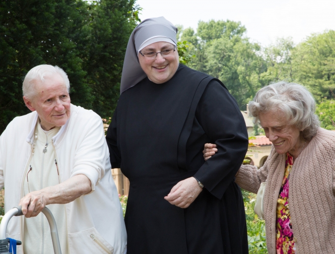 Sister Constance Veit (shown above) and other sisters interact with their dear residents.