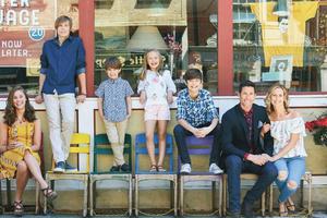Bart and Jessica Baldwin are home-schooling their children, who model with them. 