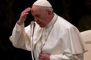 Pope Francis makes the sign of the cross during his weekly General Audience, 2019. 