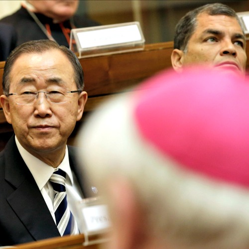 U.N. Secretary-General Ban Ki-moon (l), flanked by Ecuador's President Rafal Correa, attends a Vatican conference on the environment, at the Vatican on April 28.