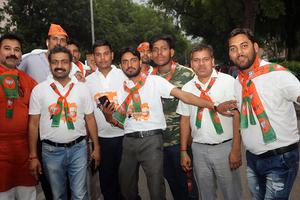 Indian voters celebrate the victory of the Bharatiya Janata Party May 23.