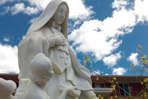 A statue of Mother Frances Cabrini adorns an outdoor shrine in her honor. 