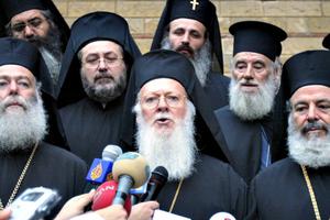 Ecumenical Patriarch Bartholomew I of Constantinople (c) addresses the media in Istanbul, Turkey. Church unity over the long-awaited Pan-Orthodox Church council is eroding just days before it is set to convene.