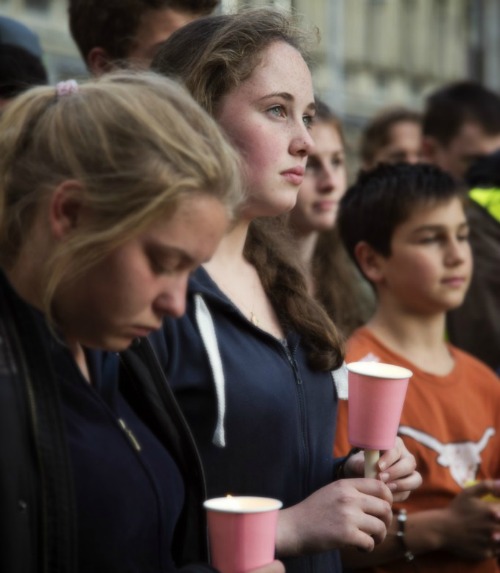 Participants hold candles at an Aug. 22 pro-life vigil outside of Ireland's legislature in Dublin.