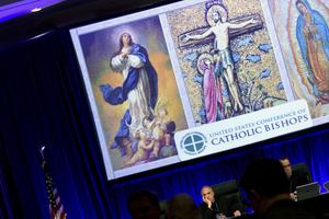 Cardinal Daniel DiNardo, president of the USCCB (l), and others wait for the opening session during the annual fall meeting of the U.S. Conference of Catholic Bishops Nov. 12 in Baltimore, Maryland. 
