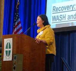 Carolyn Woo, president of Catholic Relief Services, speaks Nov. 11 to the USCCB's fall general assembly in Baltimore.