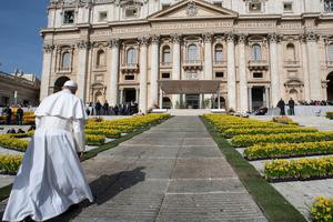 Pope Francis walks towards the St. Peter’s Basilica in  St. Peter’s Square during the Wednesday general audience on April 24.