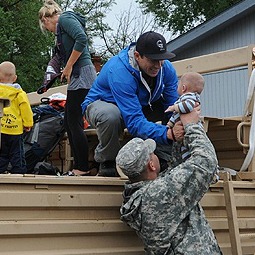 Colorado National Guardsmen assist Boulder County authorities in evacuating residents of Lyons, Colo.