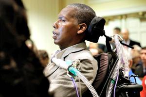 O.J. Brigance, right, a former Baltimore Ravens football player and current senior adviser to player development, testifies to Maryland lawmakers against a right-to-die bill alongside his wife, Chanda, March 10 in Annapolis, Md.