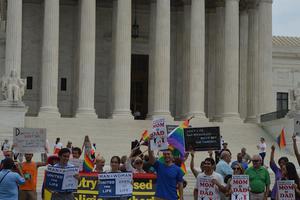 Supporters of traditional marriage and same-sex 'marriage' activists face off in front of the Supreme Court during the March for Marriage in Washington on June 19, 2014.