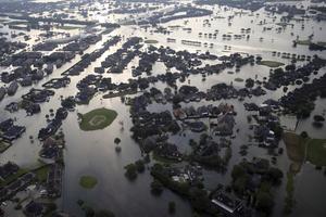 Floodwaters from Tropical Storm Harvey surround homes in Port Arthur, Texas, Aug. 31. 

