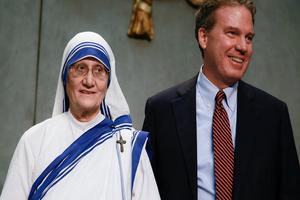 Holy See Press Director Greg Burke with Sister Mary Prema Pierick, mother superior of the Missionaries of Charity, at a press briefing on Mother Teresa's canonization at the Holy See Press Office on Sept. 2.



