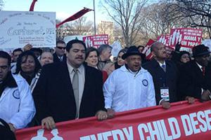 March for Marriage participants carry a banner in Washington on March 26, 2013.
