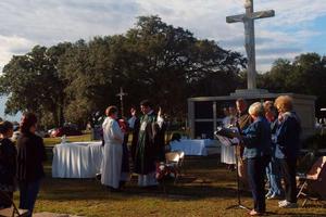 All Souls’ Day Mass is celebrated in a Catholic cemetery in Mobile, Alabama. 