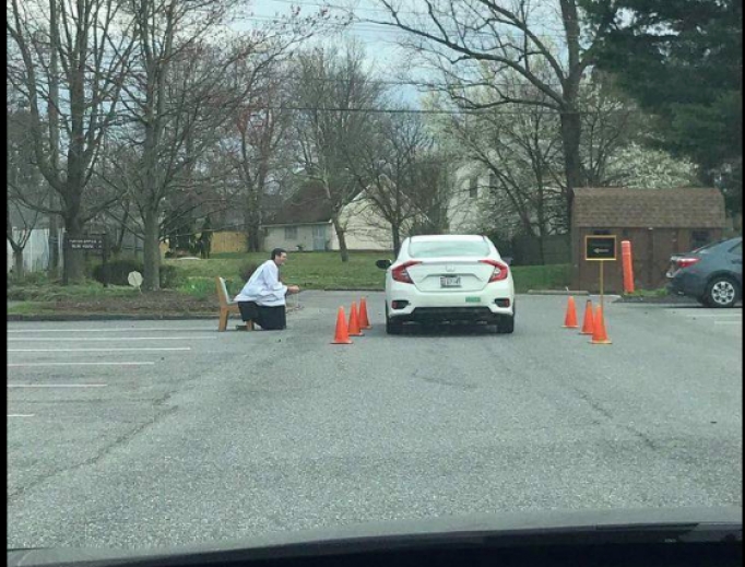 Fr. Scott Holmer of St. Edward the Confessor Catholic Church in Bowie, Md. offering a drive-thru confession. 