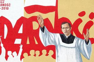 Father Jerzy Popiełuszko is pictured in a Solidarity mural in Ostrowiec Swietokrzyski, Poland