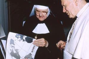 Mother Angelica briefs Pope John Paul II about aspects of EWTN's operations.
