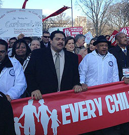 March for Marriage participants carry a banner in Washington on March 26.