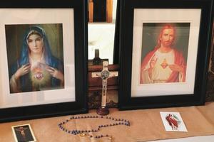 Families across the country decorate dedicated spaces in their homes to gather their domestic churches for prayer, including the Andersons in North Carolina (shown above). 