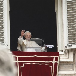 Pope Benedict XVI waves as he departs after leading the Angelus from the window of his apartment overlooking St. Peter's Square at the Vatican March 13. 
