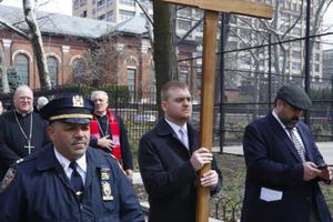 Communion & Liberation of New York during its annual Way of the Cross over the Brooklyn Bridge on Good Friday with Cardinal Nolan & Bishop Dimarzo.