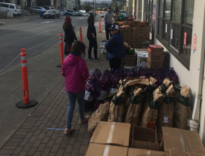  
Above, Catholic Charities of San Francisco employees from the Edith Witt Community, 10th & Mission Supportive Housing, CYO Athletics program and Volunteer Services department work together to distribute more than 8,000 pounds of food to the weekly food pantry for seniors at the OMI Senior Center. Below, Catholic Charities' St. Joseph's Family Shelter has partnered with Project Night Night and Simply the Basics to provide families in the shelter with the hygiene products they need and is giving children a book, a blanket and a stuffed animal, too.  

