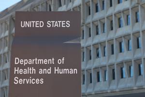 A sign is shown outside the Department for Health and Human Services in Washington, D.C. 