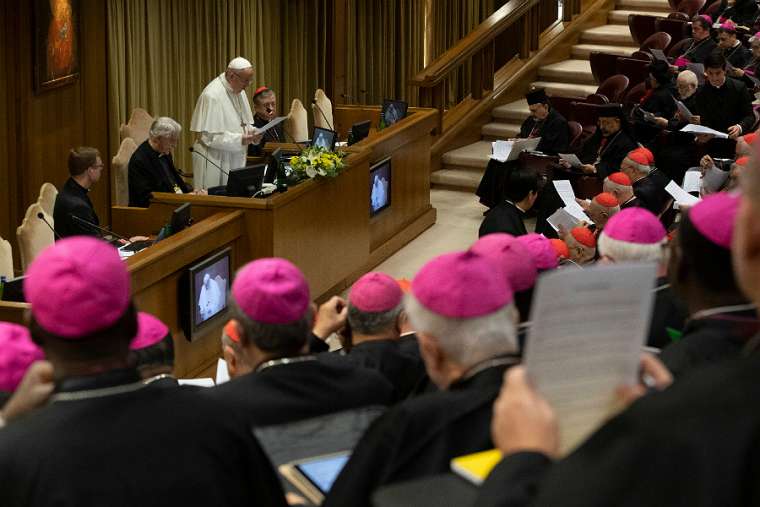Pope Francis presides at the meeting on protection of minors in the Church in the Vatican's New Synod Hall Feb. 21.