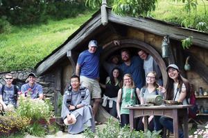 TOLKIEN TREK. Seton Hall pilgrims in front of the ‘hobbit hole’ in New Zealand. 