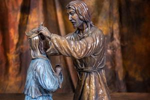 Above, the Coronation in bronze. Below, Mother Teresa statue greets the faithful at St. Patrick’s in New York; the sculptor and his wife, Judy, with the statue. Below, more Rosary casts, of the Nativity and Last Supper.
