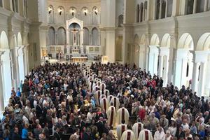 Priests process in for the July 26 Mass of dedication at Holy Name of Jesus Cathedral in Raleigh, North Carolina. 