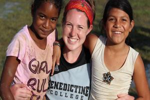 JOY OF SERVICE. A Benedictine College student volunteers at a mission in Belize. Xavier University students volunteer at a nursing home in North Carolina. Villanova University students paint a mural at the Aquinas Center in Philadelphia.