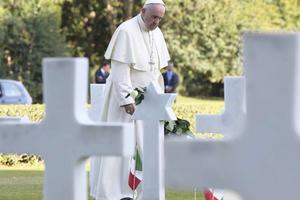 Pope Francis visits graves at the Sicily-Rome American Cemetery in Nettuno, Italy, Nov. 2, 2017.