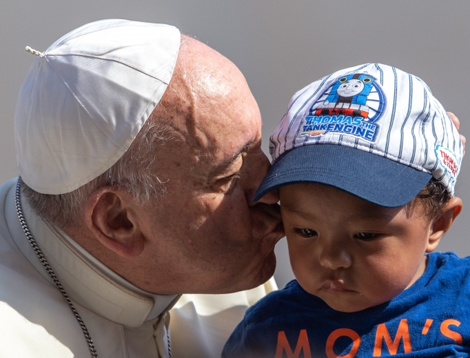 Pope Francis greets pilgrims in St. Peter's Square June 19, 2019. 
