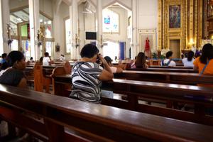 Catholics pray inside Our Lady of Peace and Safe Voyage Cathedral in Antipolo, Philippines on March 26, 2018. 