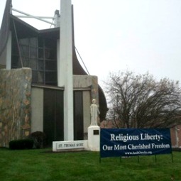 A banner outside of St. Thomas More Catholic Church in Omaha, Nebraska.